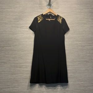 Madewell black shift dress with gold sequin shoulder detail and tie up back/neck